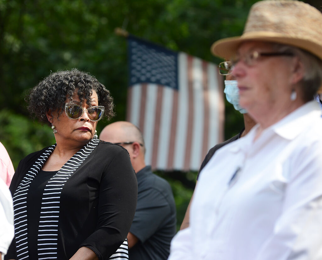 Pamela Nunnelly stands among the crowd